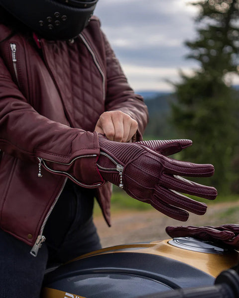 Goldtop raptor women's gloves burgundy red worn by model 