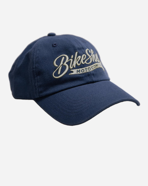 Navy blue cap script cap with 'Bike Shed Moto Company' logo on a white background