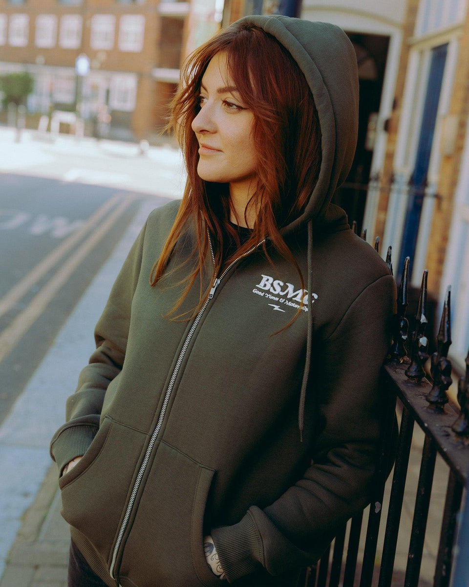 Model wearing green Bike Shed Motorcycle Co. Good Times Hooded Sweatshirt 